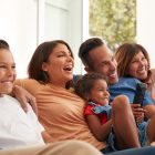 Hispanic Family watching tv