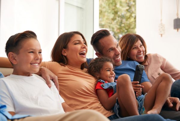 Hispanic Family watching tv