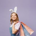 female with bunny ears and shopping bags
