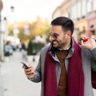 Man holiday shopping with bags